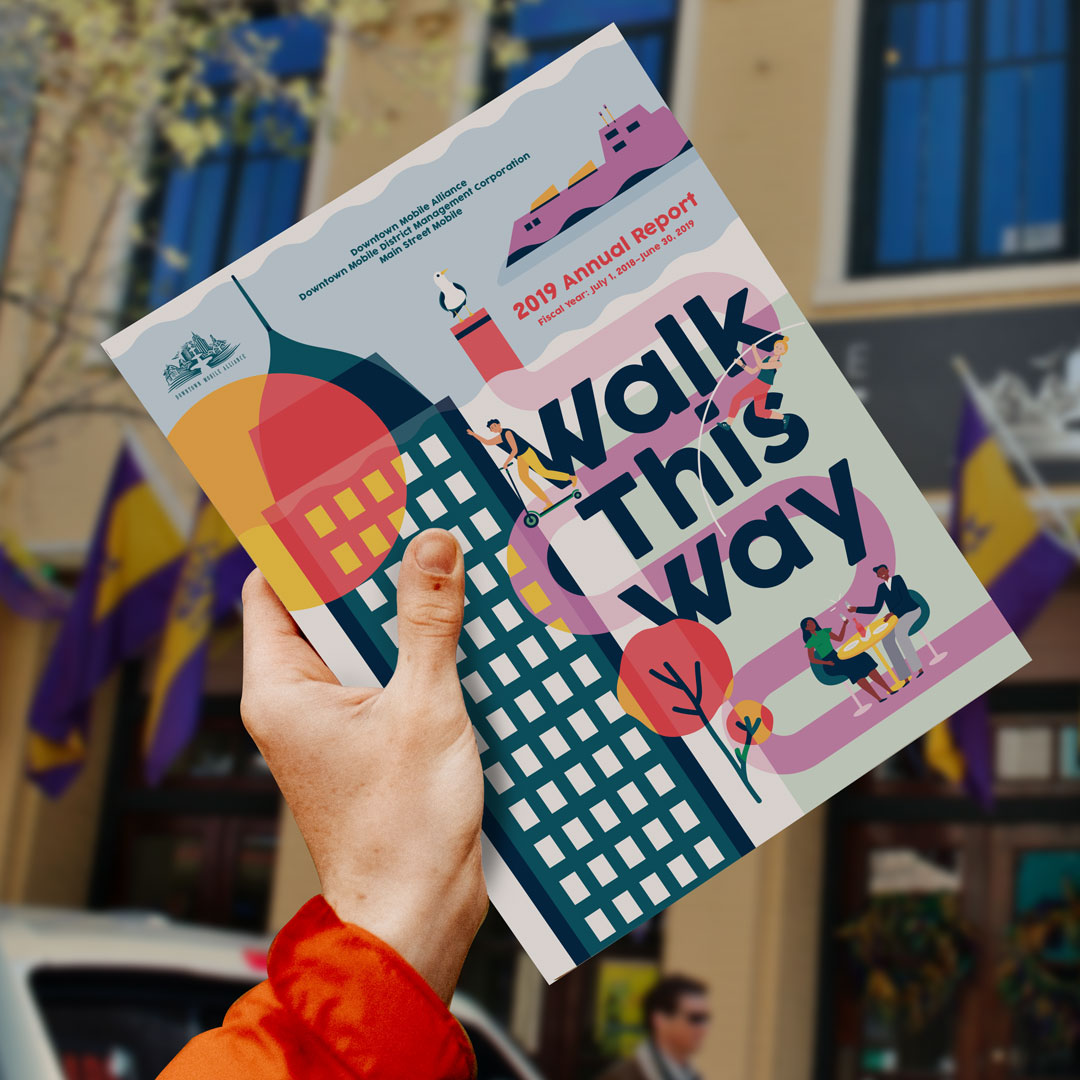 Image of the Downtown Mobile Alliance Annual Report. Magazine says "Walk this way".